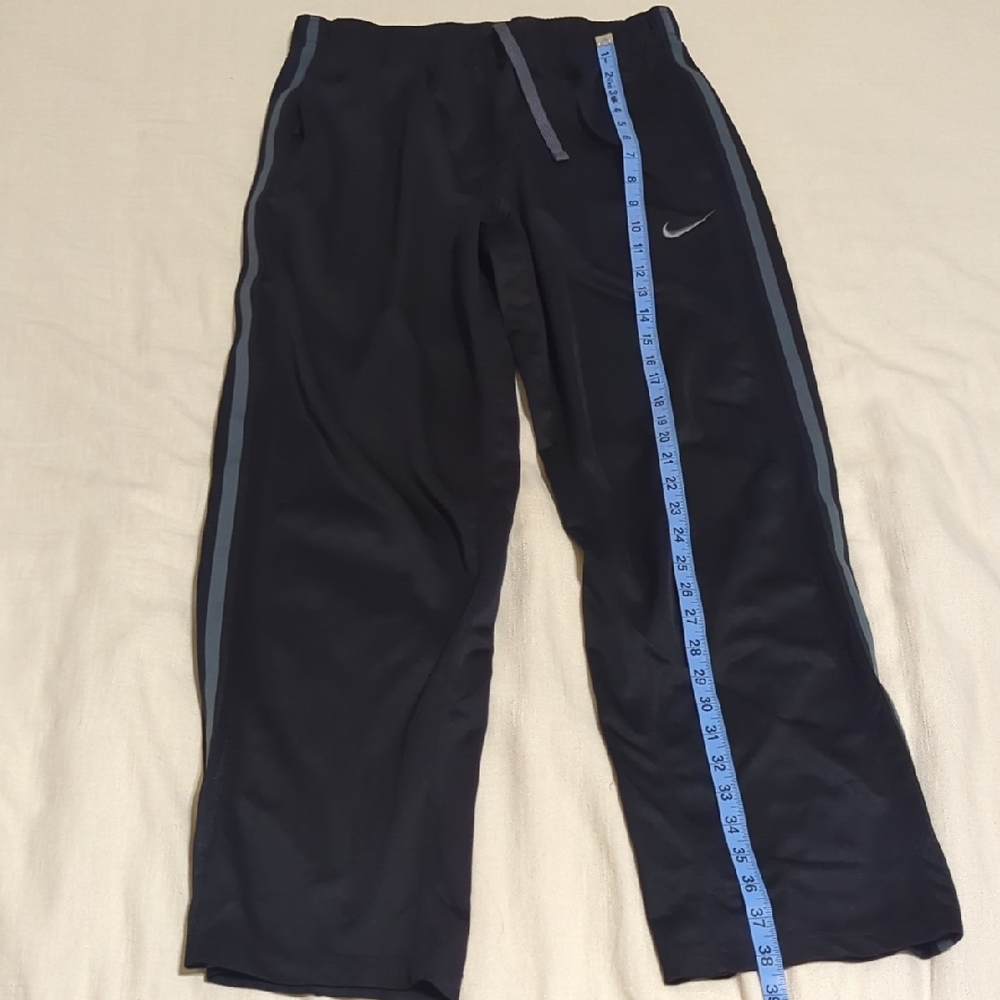 Nike Black Track Pants with Gray Side Stripes